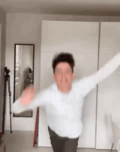 Man Standing With Arms Outstretched GIF