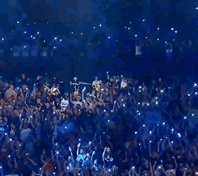 Man Standing With Arms Up GIF