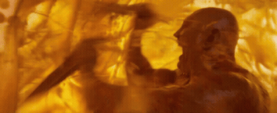 Man Standing With Yellow Painting On Wall GIF