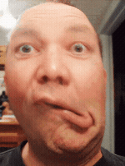 Man Sticking Tongue Out GIF