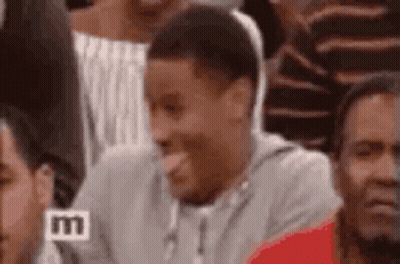 Man Sticking Tongue Out At Stadium GIF