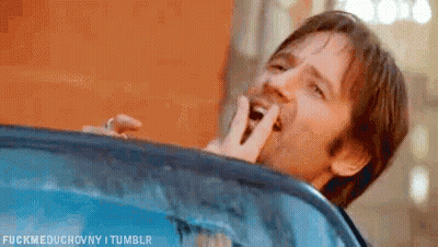 Man Sticking Tongue Out Car Window GIF