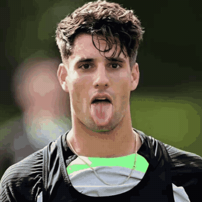 Man Sticking Tongue Out In Black Shirt GIF