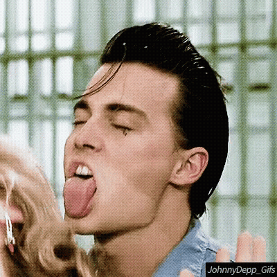 Man Sticking Tongue Out With Johnny Depp Gif