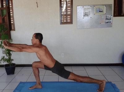 Man Stretching Legs On Blue Yoga Mat GIF