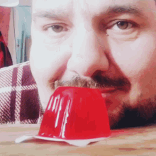 Man Sucking Red Jelly  GIF