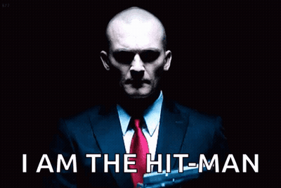 Man Suit Says I Am The Hit Man GIF