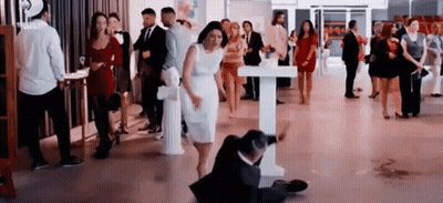 Man Suit Sitting Woman White Dress Behind GIF