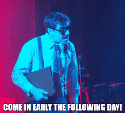 Man Suit Suspenders Holding Book Come In Early GIF