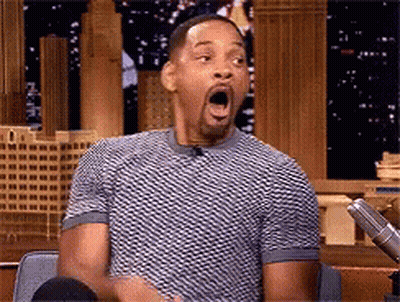 Man Surprised At Microphone With Mouth Open GIF
