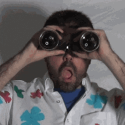 Man Surprised Looking At Binoculars GIF