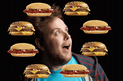 Man Surrounded By Hamburgers With Hot Dog GIF