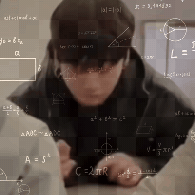 Man Surrounded By Mathematical Equations A = S2 And C = 2Jcr GIF