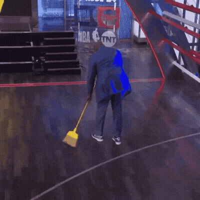 Man Sweeping Floor In Suit GIF