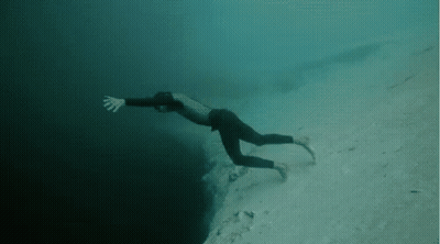 Man Swimming In Ocean GIF