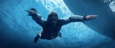 Man Swimming Through Air Over Ocean GIF