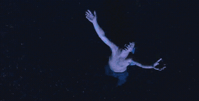 Man Swimming With Arms Outstretched GIF