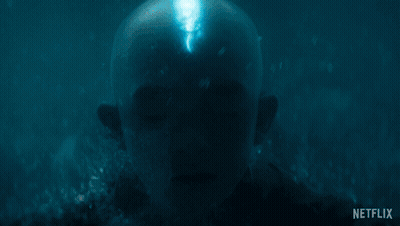 Man Swimming With Glowing Eyes