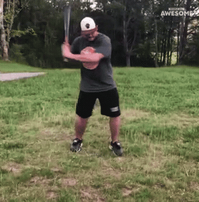 Man Swinging Baseball Bat Saying Awesome GIF
