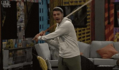Man Swinging Bat In Living Room GIF