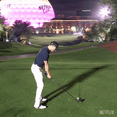 Man Swinging Golf Club GIF