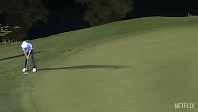 Man Swinging Golf Club GIF