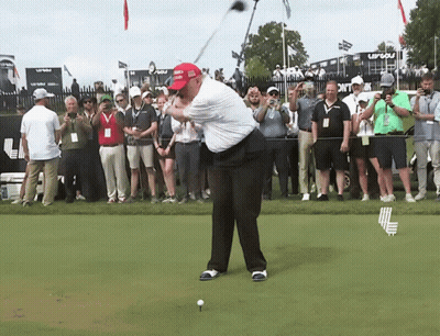 Man Swinging Golf Club In Trump Hat GIF
