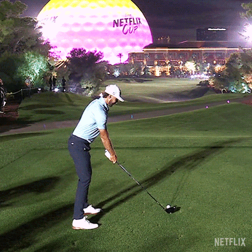 Man Swinging Golf Club GIF