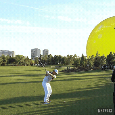 Man Swinging Golf Club GIF