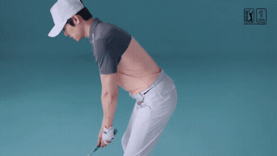 Man Swinging Golf Club Near PGA Tour Sign GIF