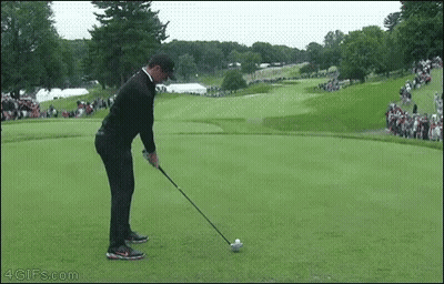 Man Swinging Golf Club GIF
