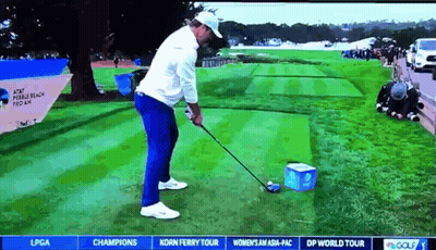 Man Swinging Golf Club GIF