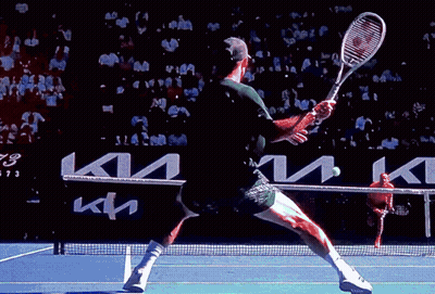 Man Swinging Tennis Racket With Kia Ad In Background GIF
