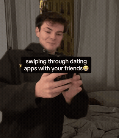 Man Swiping Dating Apps With Friends GIF