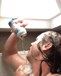 Man Taking A Bath While Drinking Beer GIF