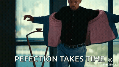 Man Taking Off Jacket Saying Perfection Takes Time GIF