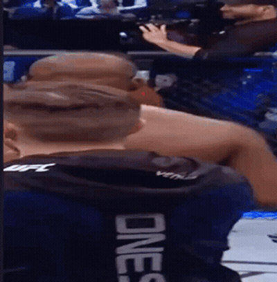 Man Taking Photo Of Fighter In One S Shirt GIF