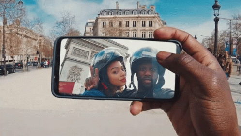 Man Taking Photo Of Woman And Man With Helmet GIF