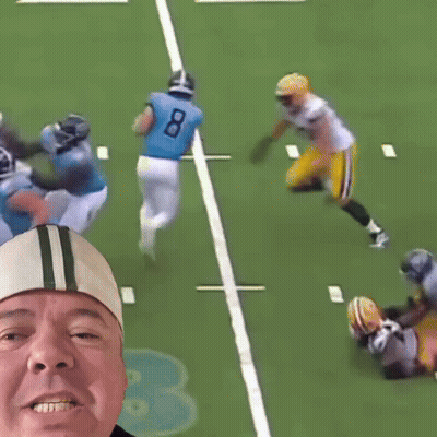 Man Taking Picture Of Football Player In Number 79 Jersey GIF