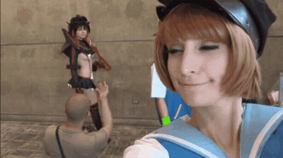 Man Taking Picture Of Girl In Cosplay GIF