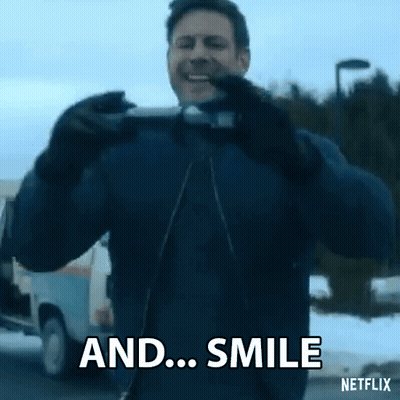 Man Taking Picture Saying And Smile GIF