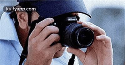 Man Taking Picture With Camera GIF