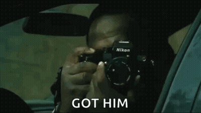 Man Taking Picture With Camera In Car GIF