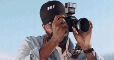 Man Taking Picture With Self Hat GIF