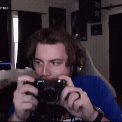 Man Taking Picture With Sony Camera GIF