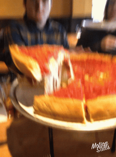 Man Taking Pizza From Motion Stills Plate GIF