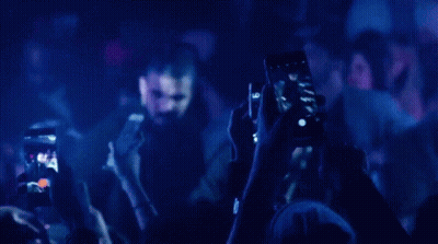 Man Taking Selfie At Party GIF