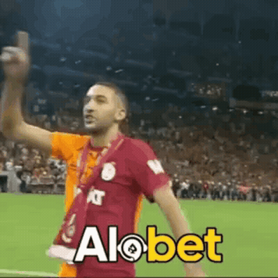 Man Taking Selfie On Soccer Field Alobet GIF