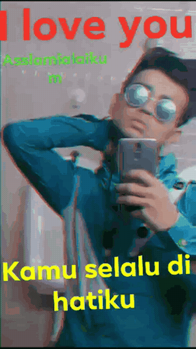 Man Taking Selfie Saying I Love You GIF