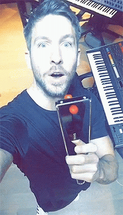Man Taking Selfie With Piano GIF